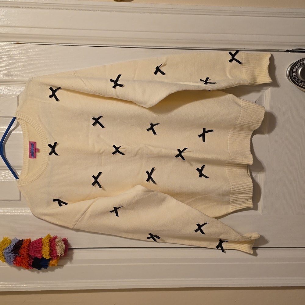 NWIT Edikted Cream Sweater with Black Bow Accents